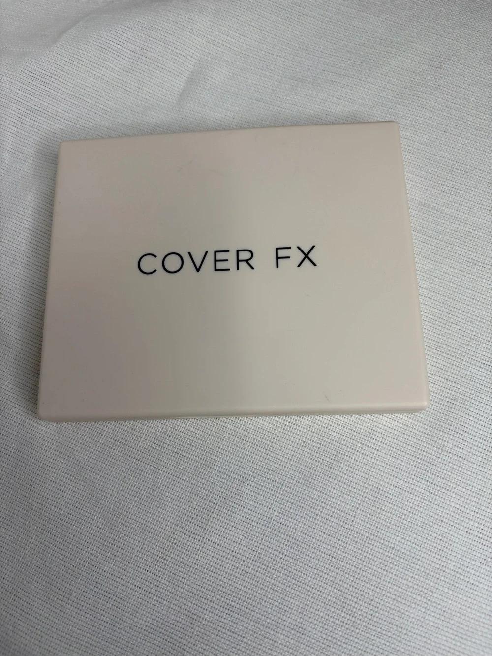 COVER FX Compact Bronzer Case in Pale Pink-Beige with Black Logo